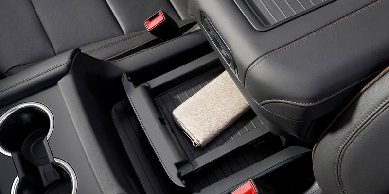 Mobile below the seat drawer and for placing bottle area in Chevrolet Tahoe