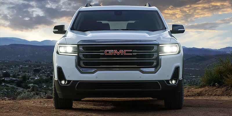 Front View of White Acadia with GMC logo