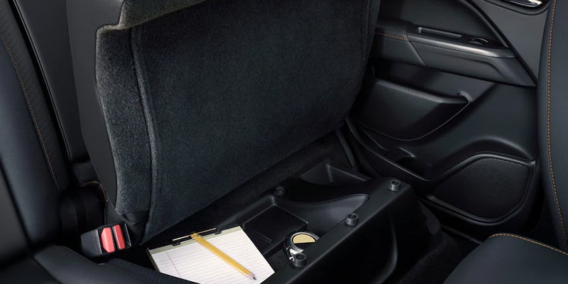 Notepad and pencil placed below seat Drawer